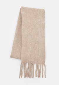 Beige ullschal med en mjuk textur, med fransar i kanten. Designen är enkel utan mönster eller ytterligare detaljer.