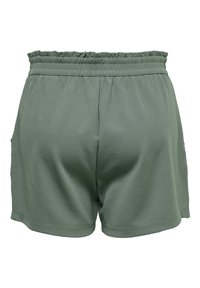 Zelené, lehké šortky s elastickým, volánkovým páskem a hladkým povrchem. Mají boční kapsy a uvolněný střih.