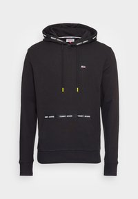 Czarna bluza z kapturem wykonana z bawełny, z przednią kieszenią, sznurkiem z żółtymi końcówkami oraz elastycznym pasem z logo "TOMMY JEANS."
