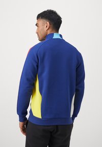 adidas Performance ARSENAL FC URBAN PURIST - Klub merchandise - victory blue/bright yellow/bright cyan