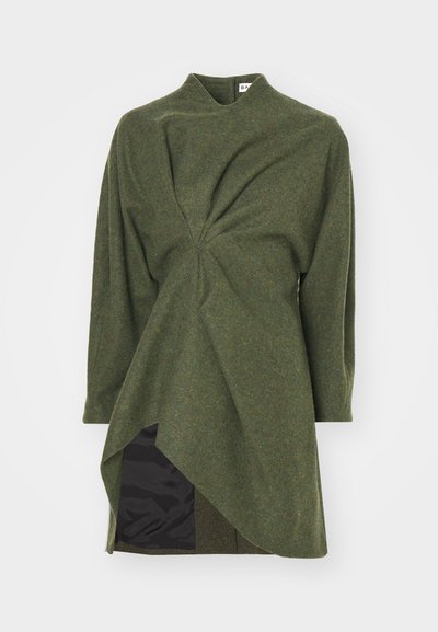 Green wool blend dress with a high collar, asymmetric hem, and twisted detailing at the waist; features a black inner lining.