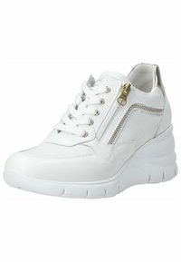 White sneaker with lace-up closure, zipper detail, and metallic accents. Features a textured upper and thick, cushioned sole.