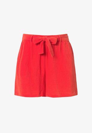 Red shorts in crinkled textured fabric with a fitted waistband and a tied bow detail at the front. Loose-fitting design and above-knee length.