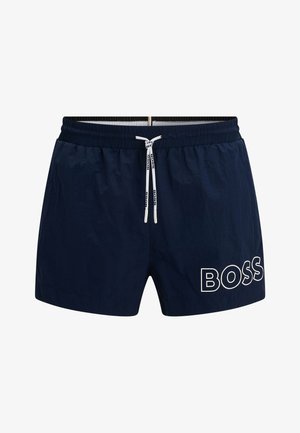 Costumi da bagno da uomo in color navy realizzati in tessuto leggero, con vita regolabile tramite cordino, tasche laterali e logo "BOSS" bianco in basso a sinistra.