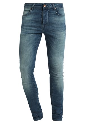 Skinny-fit blauwe spijkerbroeken met een lichte vervaging, knoopsluiting, vijf-pocket ontwerp en contrasterende stikseldetails.