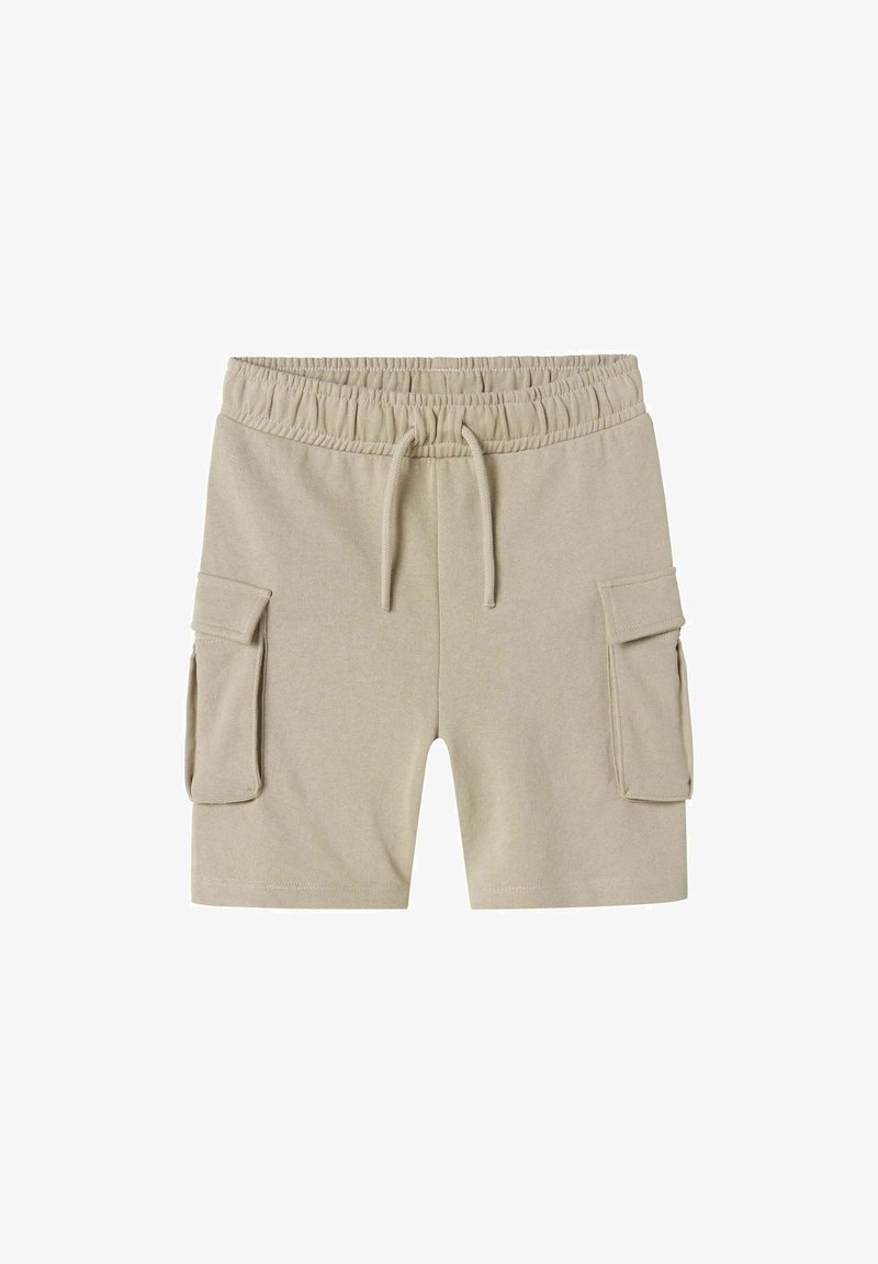 Pantaloni cargo beige realizzati in tessuto morbido, con vita elasticizzata, cordoncino e due tasche cargo laterali.