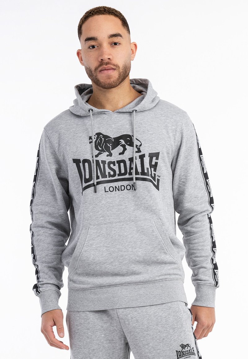 Gray hooded sweatshirt with a black lion logo and "Lonsdale London" text. Features black accent strips along the sleeves and a kangaroo pocket.