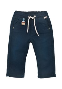 Marineblaue Jeanshose mit einem Kordelzugbund, Fronttaschen und einem dekorativen patch auf der linken Tasche.