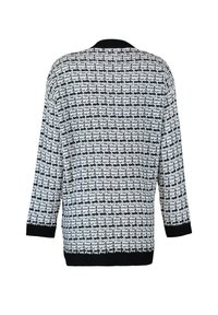 Schwarz-weiß gemusterte Strickjacke mit lockerem Schnitt, 3/4-Ärmeln und schwarzen, gerippten Akzenten am Kragen und den Bündchen.