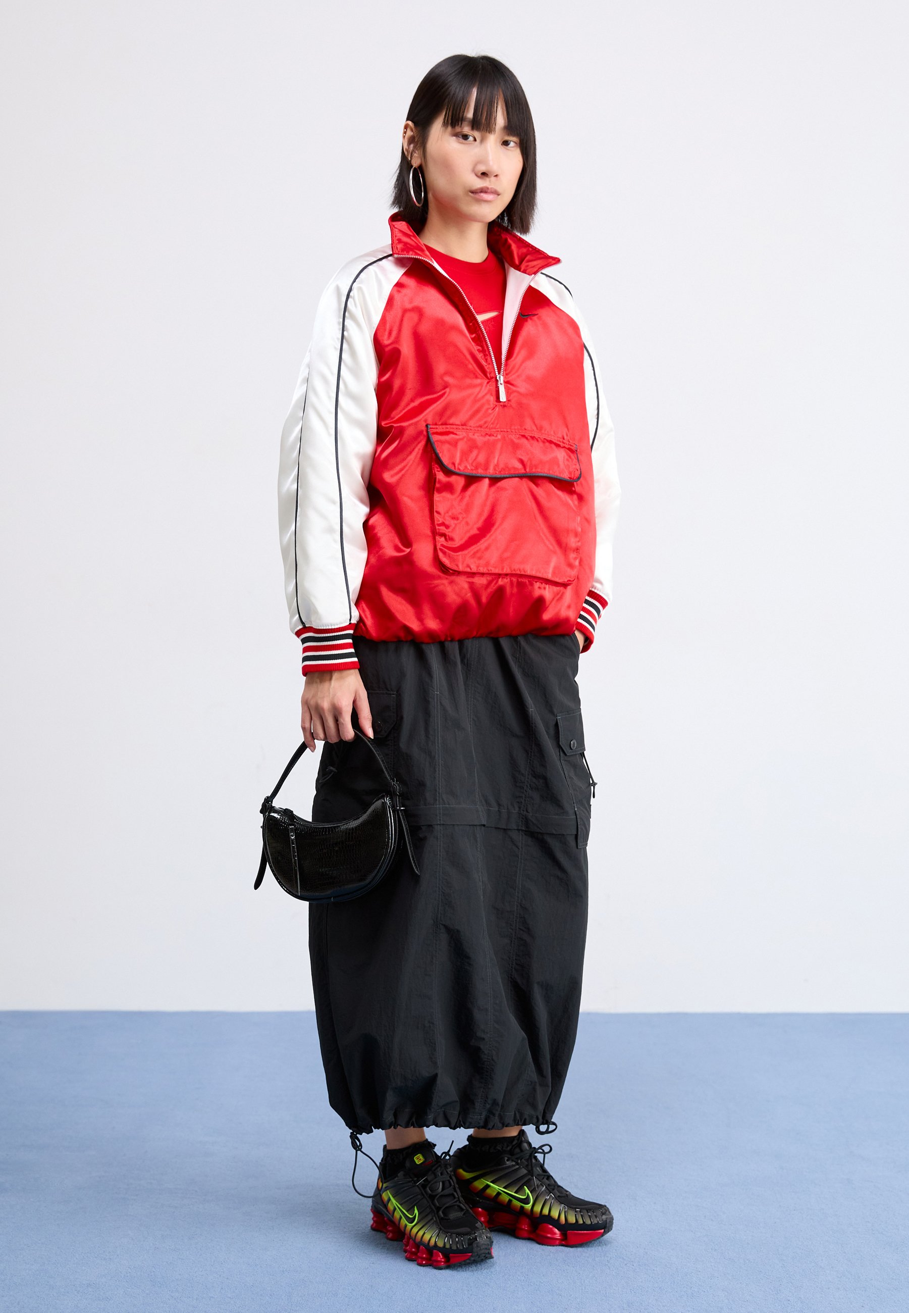 red and black nike coat