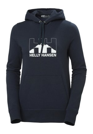 Sudadera azul marino con un bolsillo tipo canguro en la parte frontal, capucha con cordón y logo blanco "Helly Hansen" en el pecho. Textura de tela suave.