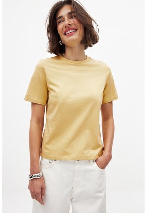 NA-KD T-shirt basic - dusty yellow