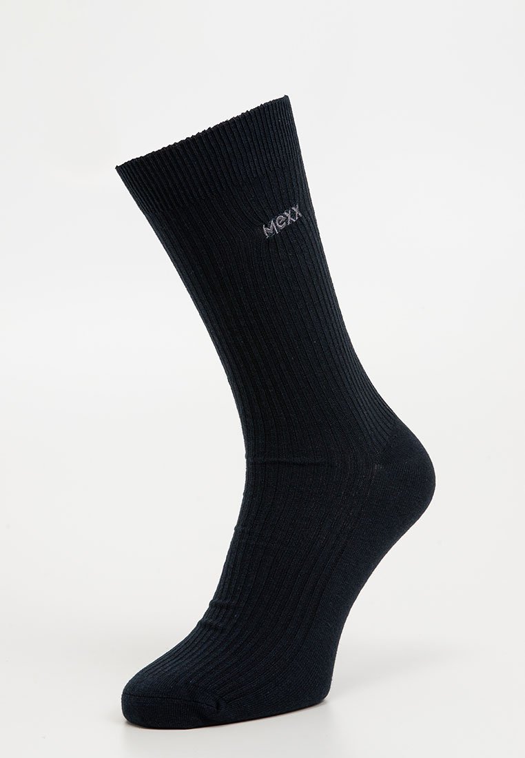 Zwarte geribde sok gemaakt van zacht materiaal. Bevat een versterkte teen en hiel met een klein logo in zilver aan de zijkant.