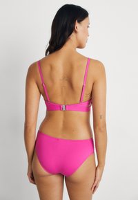 Seafolly SEAFOLLY COLLECTIVE MULTI STRAP HIPSTER PANT - Bikini alsók - hot pink