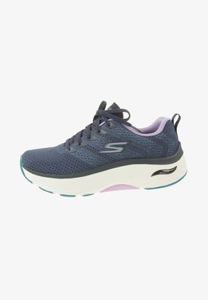 Navy blue sneaker with lavender accents, white sole, arch support, laces, and Skechers logo on the side.