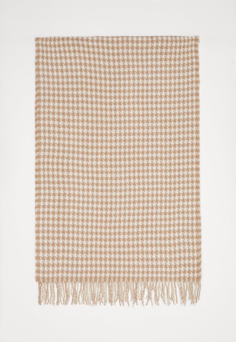Beige ja valge houndstooth-mustriga sall. Pehme tekstuur, frangeeritud servad, ristkülikukuju, ideaalne soe ja stiilne aksessuaar.