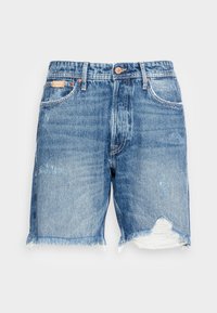 Jeansshorts i blått med en sliten finish. Har fransade fållar, blekt tyg och synliga stygn. Klassisk femficksdesign.