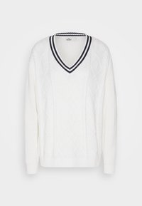 Vit stickad tröja med v-ringad hals, marinblå och vit randig ribbad krage, texturerade diamantmönster och ribbade ärmslut.