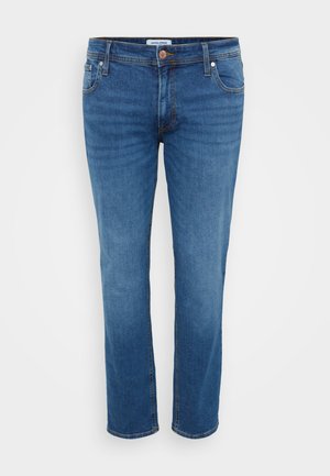 Džinsai vidutinės mėlynos spalvos, tiesaus kirpimo, su penkių kišenių dizainu ir mygtuku užsegimui juosmens srityje.