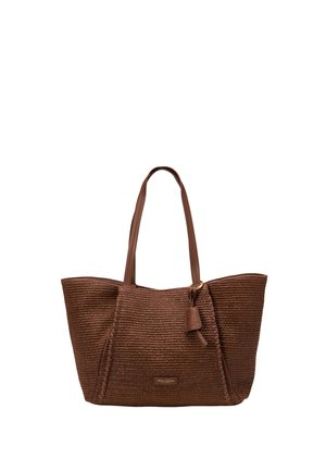 Sac cabas tissé marron avec deux poignées en cuir et une petite étiquette en cuir attachée près de la poignée.