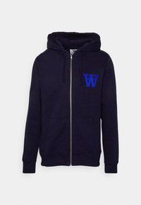 Navy zip-up hoodie made from cotton. It features a drawstring hood, front pockets, and a blue embroidered logo on the chest.