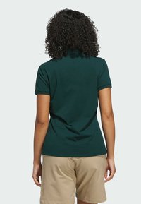 adidas Performance ULTIMATE TOUR TWIST - Piké - aurora ivy