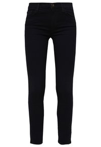 Svarta smala jeans i denim med en klassisk design med fem fickor, dragkedja och en bronsknapp som accent vid midjan.