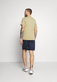 Nike Performance Calções desportivos - obsidian/white