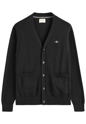 Zwarte cardigan van gebreid materiaal met een V-hals, knoopsluiting, twee voorkanten zakken en een klein GANT-logo op de borst.
