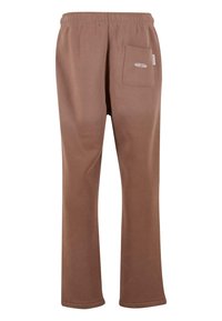 Braune Sweathosen aus weichem Stoff, mit einem elastischen Bund, geraden Beinen und einer einzelnen aufgesetzten Tasche auf der Rückseite.