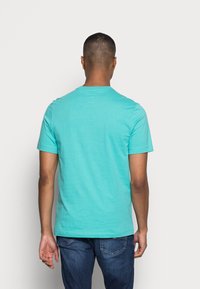 Nike Sportswear CLUB TEE - T-shirt básica - washed teal