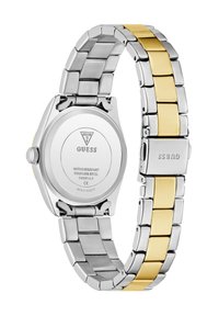 Montre-bracelet en acier inoxydable avec un bracelet bicolore comportant des maillons argentés et dorés. Boîtier rond avec une finition lisse et poli et étanchéité.