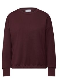 Bordová mikina s kulatým výstřihem, kleslými rameny a žebrovanými manžetami. Měkká textury tkaniny. Lem má mírně nařasený finiš.