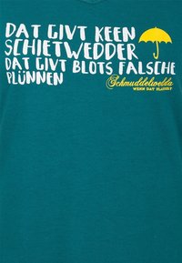 Tyrkysové bavlněné tričko s bílými a žlutými textovými motivy. Text obsahuje žlutou grafiku deštníku a je napsán hravým písmem.