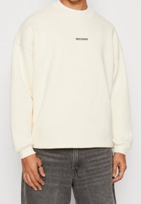 WRSTBHVR Felpa con zip - beige