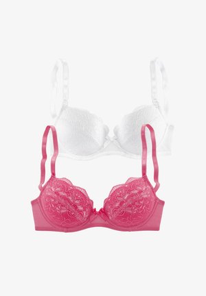 Two bras: one white with lace overlay and scalloped edges, the other pink with textured floral lace and satin accents, both with adjustable straps.