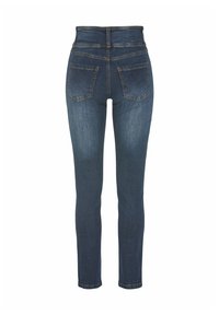 Höga skinny jeans i mörkblå denim. Har fem fickor och subtila blekningar på låren, med en mjuk textur och rena sömmar.
