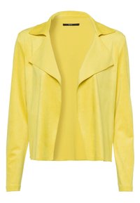 Żółta zamszowa kurtka z szerokim kołnierzem, otwartym przodem i długimi rękawami. Miękka tekstura, gładkie wykończenie, minimalistyczny design i brak widocznych elementów metalowych.