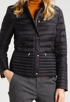 Gewatteerde jas - black