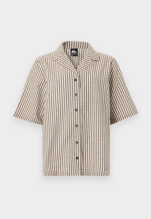 Rövid ujjú, gombos ing bézs, barna és fehér kockás mintával és széles gallérral.