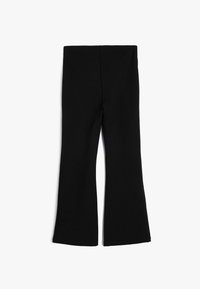 Schwarze ausgestellte Hosen aus dehnbarem Material. Sie verfügen über einen hohen, nahtlosen Bund und eine glatte Textur, mit ausgeflogenen Säumen an den Knöcheln.