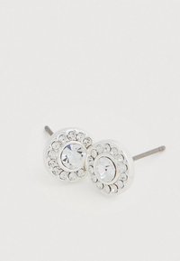 Brincos de prata em botão com um cristal transparente central rodeado por pequenas zircónias cúbicas, forma redonda com acabamento polido.