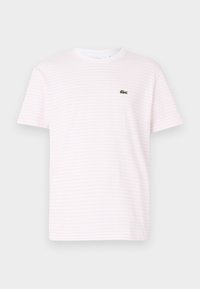 Wzorzysty t-shirt z krótkim rękawem w jasnoróżowym i białym kolorze, z okrągłym dekoltem i małym zielonym logo krokodyla na piersi.