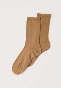 Atlasīts, medium beige