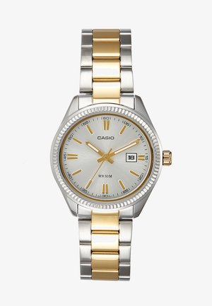 Relógio Casio em prata e tom dourado com mostrador redondo, mostrador minimalista, marcadores finos, display de data e pulseira de metais mistos. À prova de água até 50M.