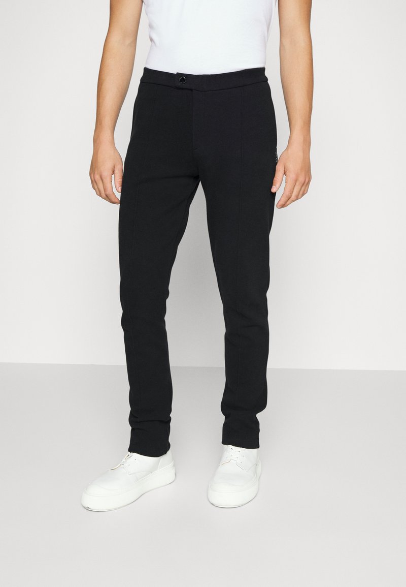 Ron Dorff - PIQUÉ TENNIS - Pantalon classique - black