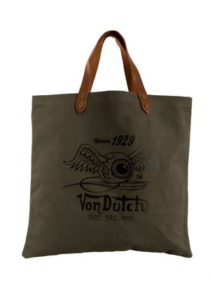 Sac cabas en toile marron avec anses en cuir, arborant un logo d’œil ailé et le texte « Since 1929 Von Dutch » sur le devant.