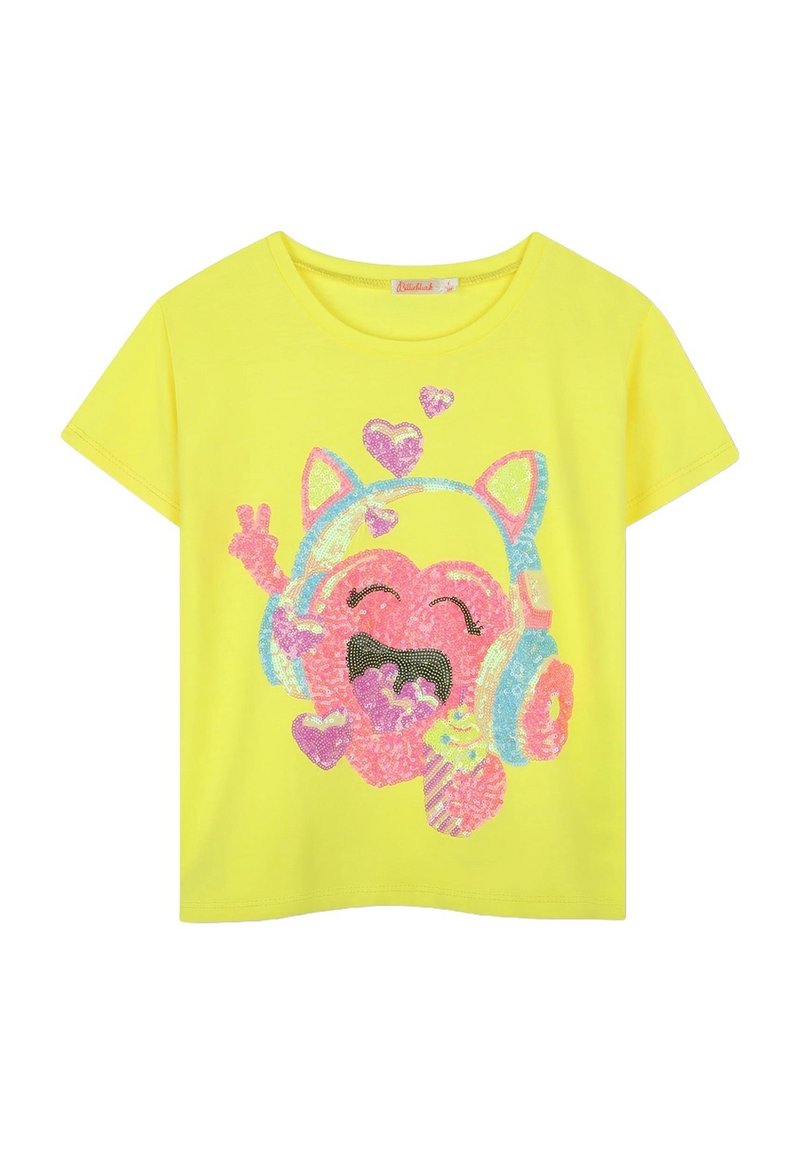 T-shirt gialla con una grafica colorata in paillettes di un personaggio felice con cuffie, cuori e un cupcake. Maniche corte, collo rotondo.