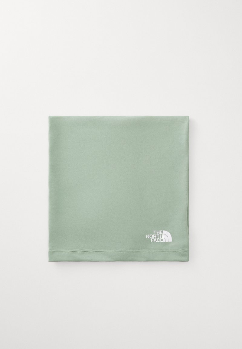 Green neck gaiter made of soft fabric. Features a white logo of The North Face on the lower right corner. Smooth texture, rectangular shape.