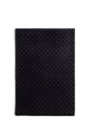Navy scarf featuring a textured surface with small, light grey dots, finished with a fringe along the bottom edge. Soft material.